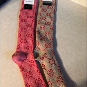 2 pairs Gucci socks. Fits shoe size 5 to 9